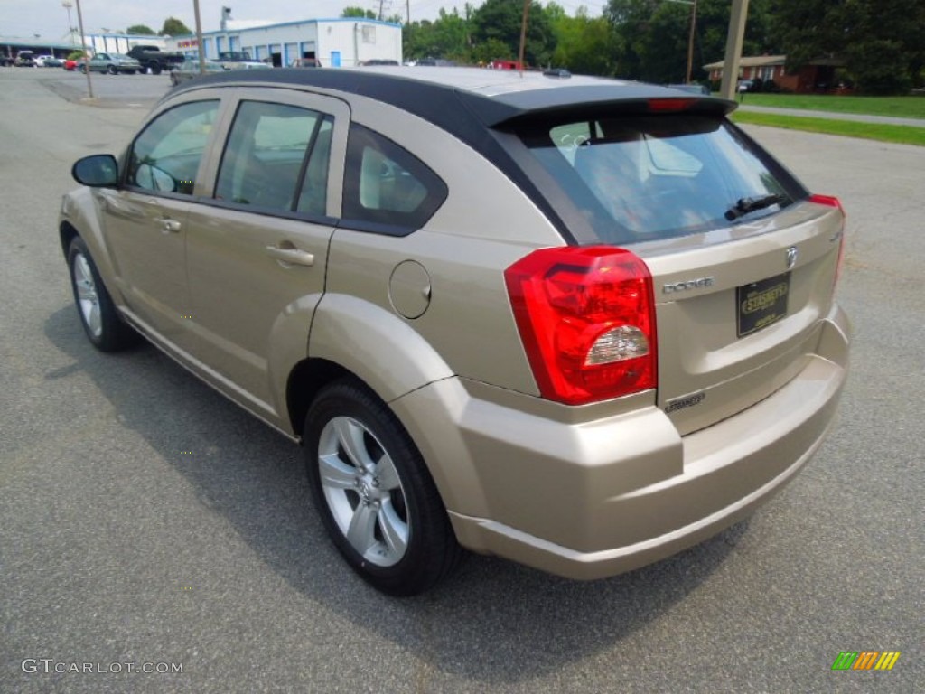 Light Sandstone Metallic 2010 Dodge Caliber Mainstreet Exterior Photo #68976402