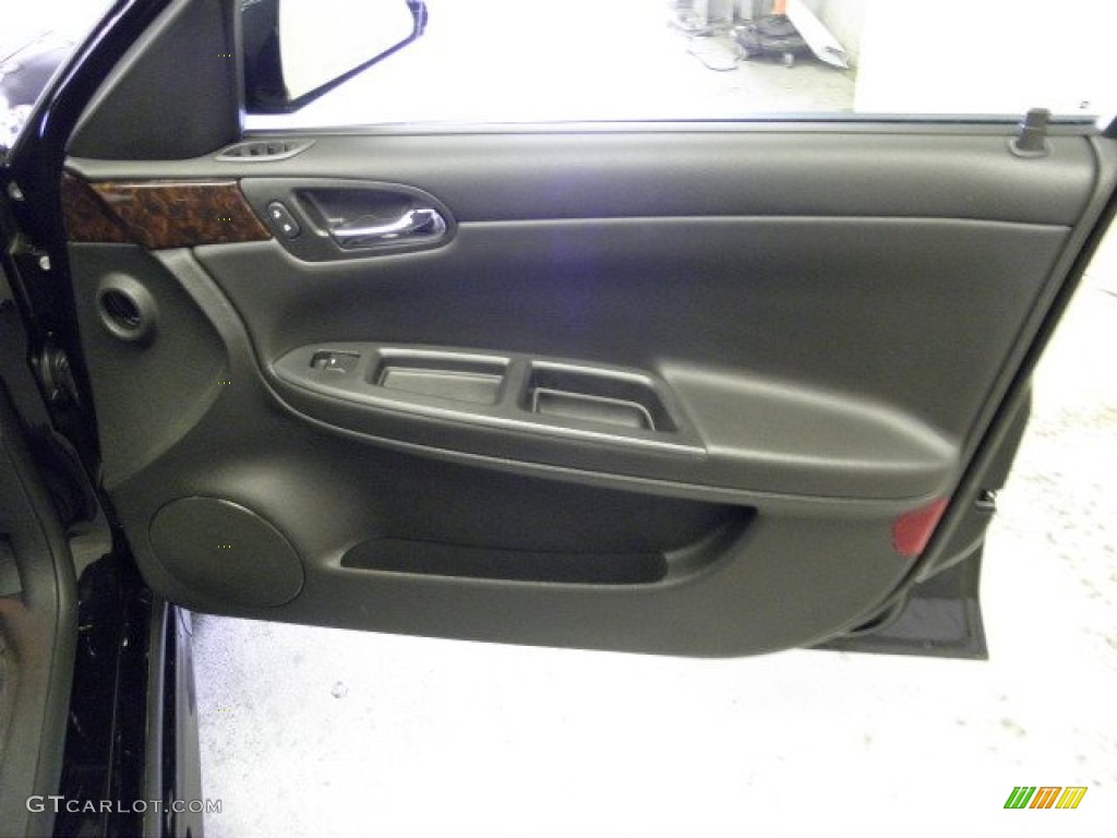 2012 Chevrolet Impala LS Ebony Door Panel Photo #69001993