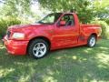 2003 Bright Red Ford F150 SVT Lightning  photo #2