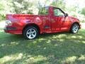 2003 Bright Red Ford F150 SVT Lightning  photo #12