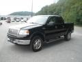 2005 Black Ford F150 Lariat SuperCrew 4x4  photo #11