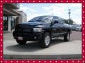 2004 Black Dodge Ram 1500 SLT Quad Cab 4x4  photo #16