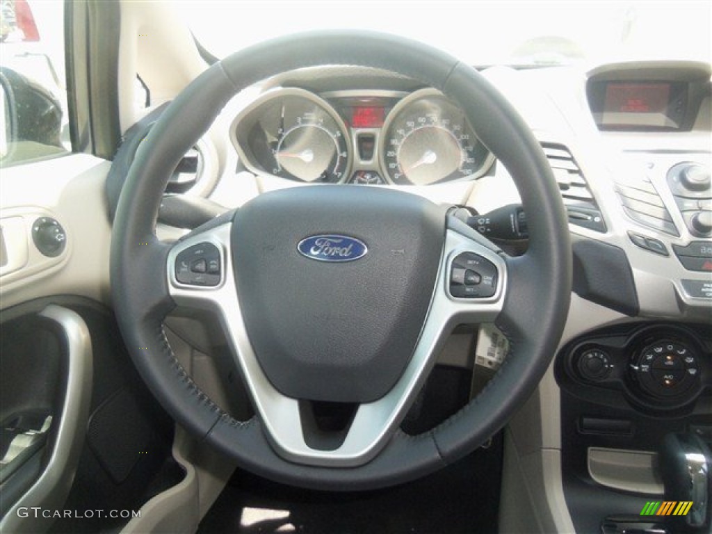 2013 Ford Fiesta SE Sedan Charcoal Black/Light Stone Steering Wheel Photo #69107972