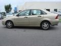 2000 Fort Knox Gold Metallic Ford Focus SE Sedan  photo #3