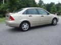 2000 Fort Knox Gold Metallic Ford Focus SE Sedan  photo #4