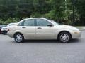 2000 Fort Knox Gold Metallic Ford Focus SE Sedan  photo #5