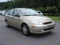 2000 Fort Knox Gold Metallic Ford Focus SE Sedan  photo #6