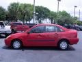 2002 Infra Red Ford Focus LX Sedan  photo #8