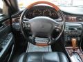 1999 Sable Black Cadillac Seville STS  photo #9