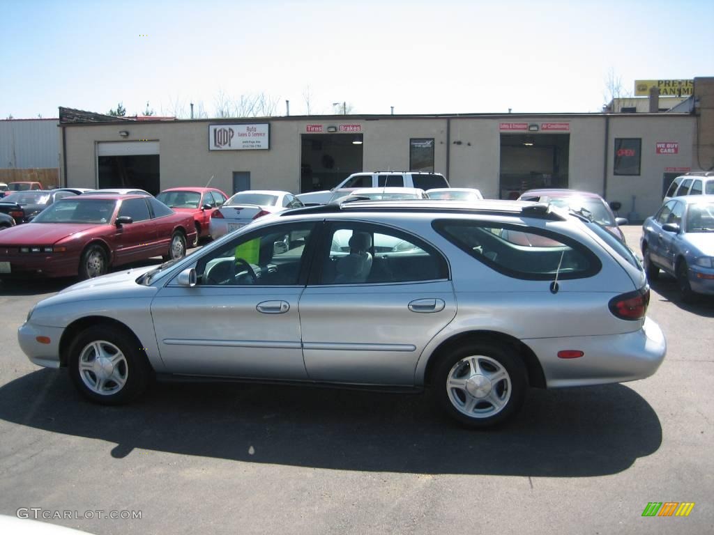 Silver Frost Metallic Ford Taurus