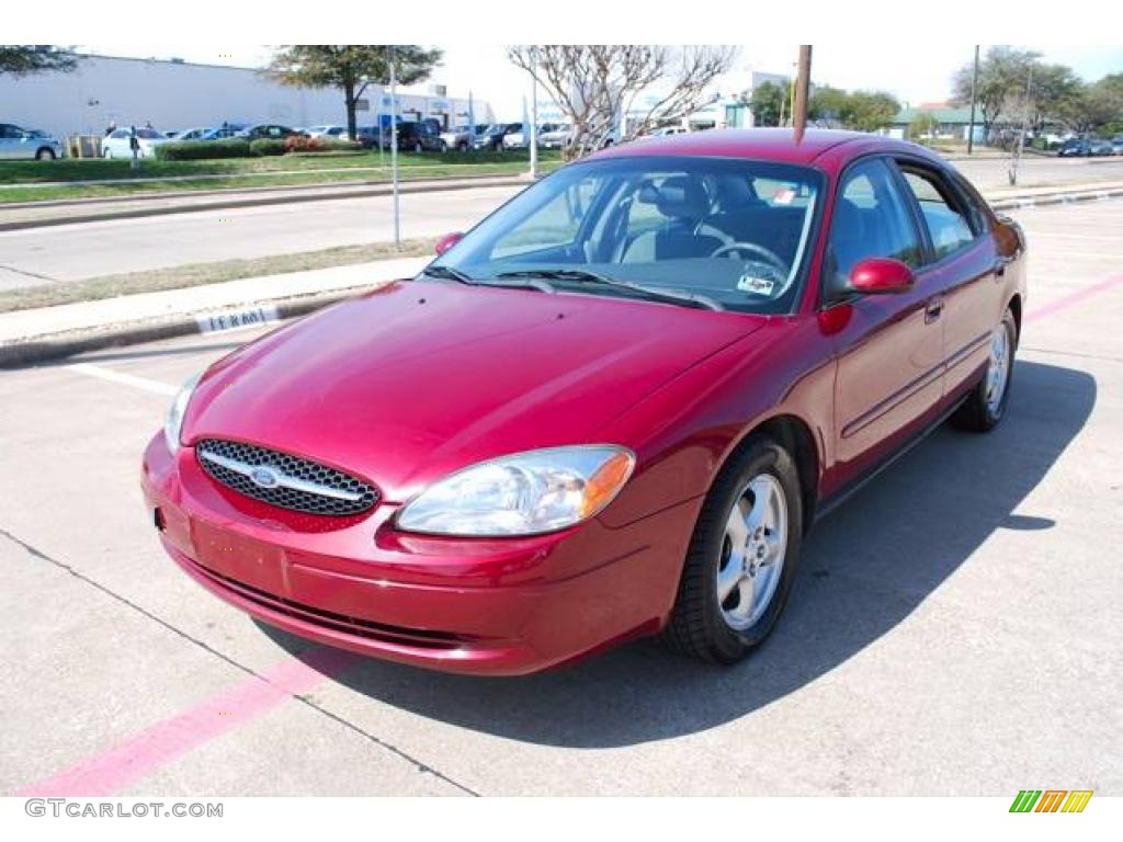 2002 Taurus SE - Matador Red Metallic / Medium Graphite photo #3