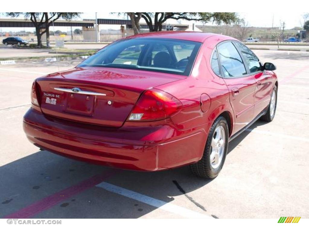 2002 Taurus SE - Matador Red Metallic / Medium Graphite photo #7