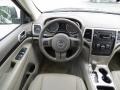 2011 Natural Green Pearl Jeep Grand Cherokee Laredo X Package  photo #21