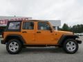 2012 Dozer Yellow Jeep Wrangler Unlimited Sport S 4x4  photo #8