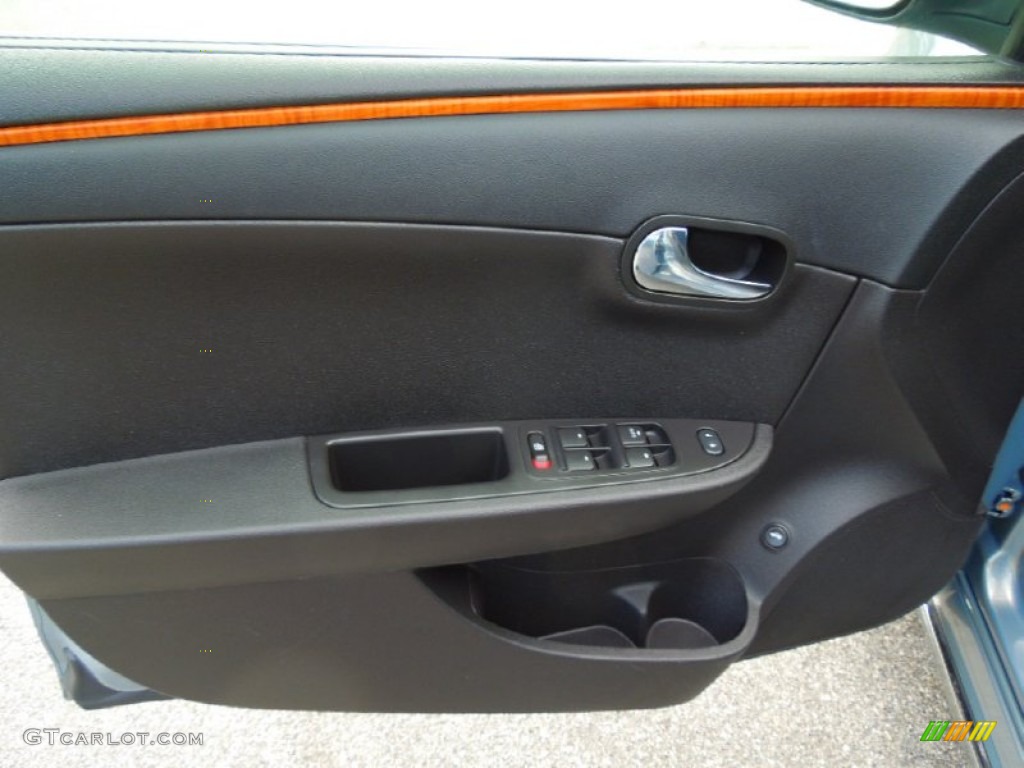 2009 Chevrolet Malibu LT Sedan Ebony Door Panel Photo #69278745