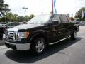 2009 Black Ford F150 XLT SuperCrew  photo #4