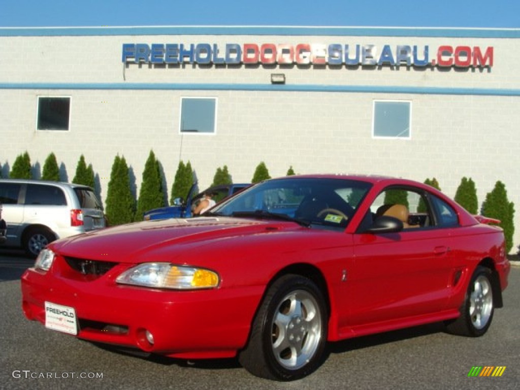 1995 Mustang SVT Cobra Coupe - Rio Red / Saddle photo #1