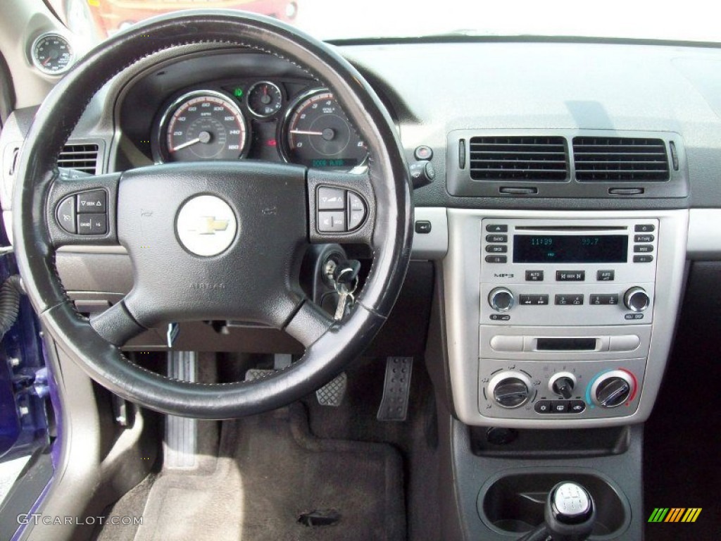 2006 Chevrolet Cobalt SS Supercharged Coupe Ebony/Blue Dashboard Photo #69323049