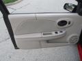 Beige 2006 Saturn ION 2 Quad Coupe Door Panel