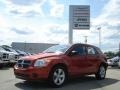 2010 Sunburst Orange Pearl Dodge Caliber SXT  photo #1