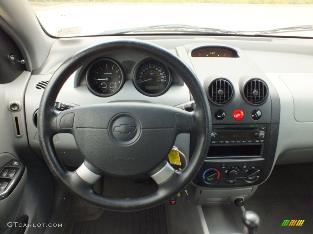 2004 Chevrolet Aveo LS Sedan Gray Steering Wheel Photo #69356275