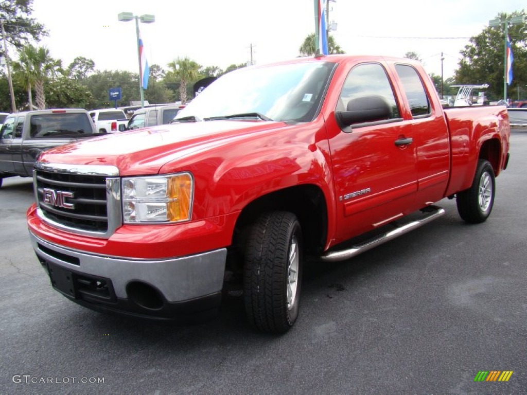 Fire Red 2009 GMC Sierra 1500 SLE Extended Cab Exterior Photo #69362335