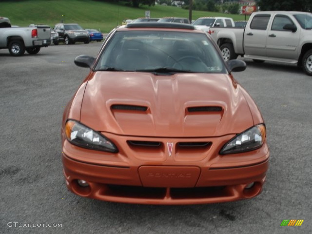 2004 Grand Am GT Sedan - Fusion Orange Metallic / Dark Pewter photo #3