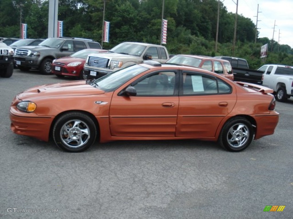 2004 Grand Am GT Sedan - Fusion Orange Metallic / Dark Pewter photo #5