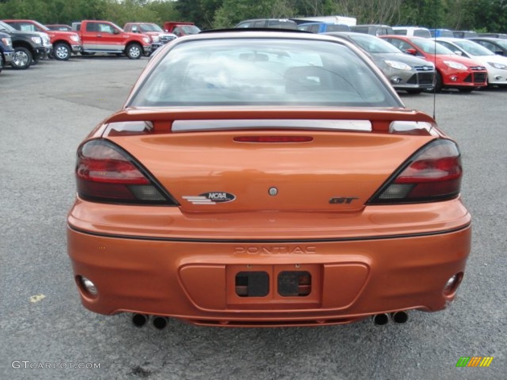 2004 Grand Am GT Sedan - Fusion Orange Metallic / Dark Pewter photo #7