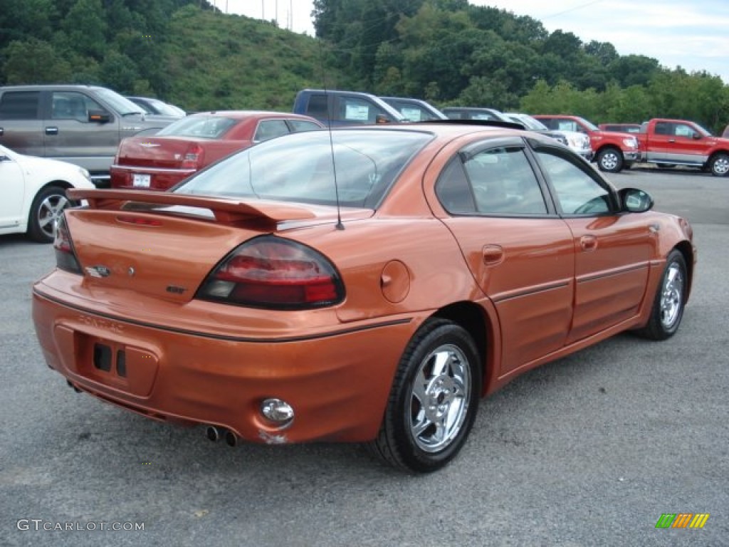 2004 Grand Am GT Sedan - Fusion Orange Metallic / Dark Pewter photo #8