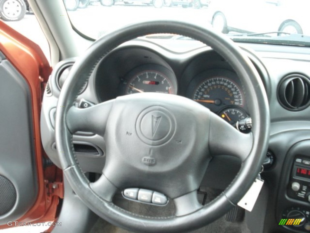 2004 Grand Am GT Sedan - Fusion Orange Metallic / Dark Pewter photo #18