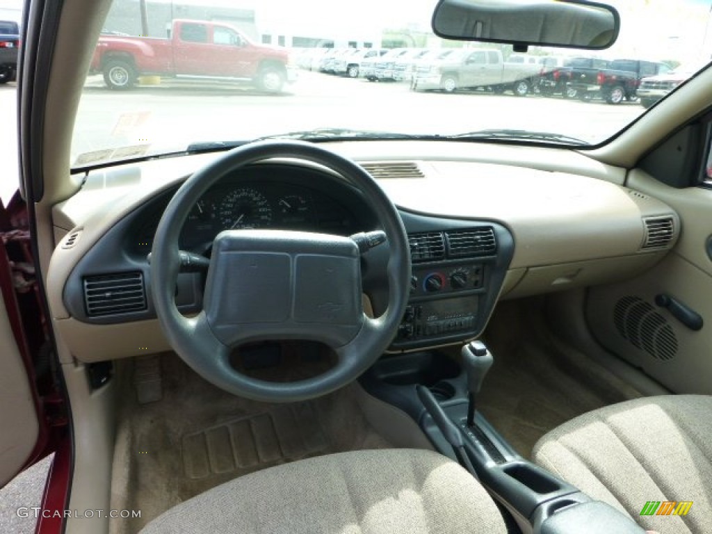 1999 Cavalier Sedan - Cayenne Red Metallic / Neutral photo #10