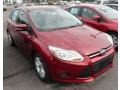 2013 Ruby Red Ford Focus SE Hatchback  photo #2