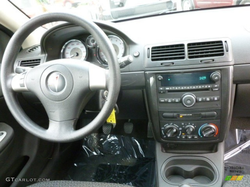 2007 Pontiac G5 Standard G5 Model Ebony Dashboard Photo #69404976