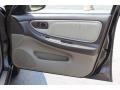 Tan 1998 Nissan Altima GLE Door Panel