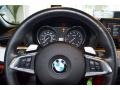 Coral Red 2010 BMW Z4 sDrive35i Roadster Steering Wheel