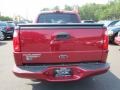 2004 Red Fire Metallic Ford Explorer Sport Trac XLT 4x4  photo #8