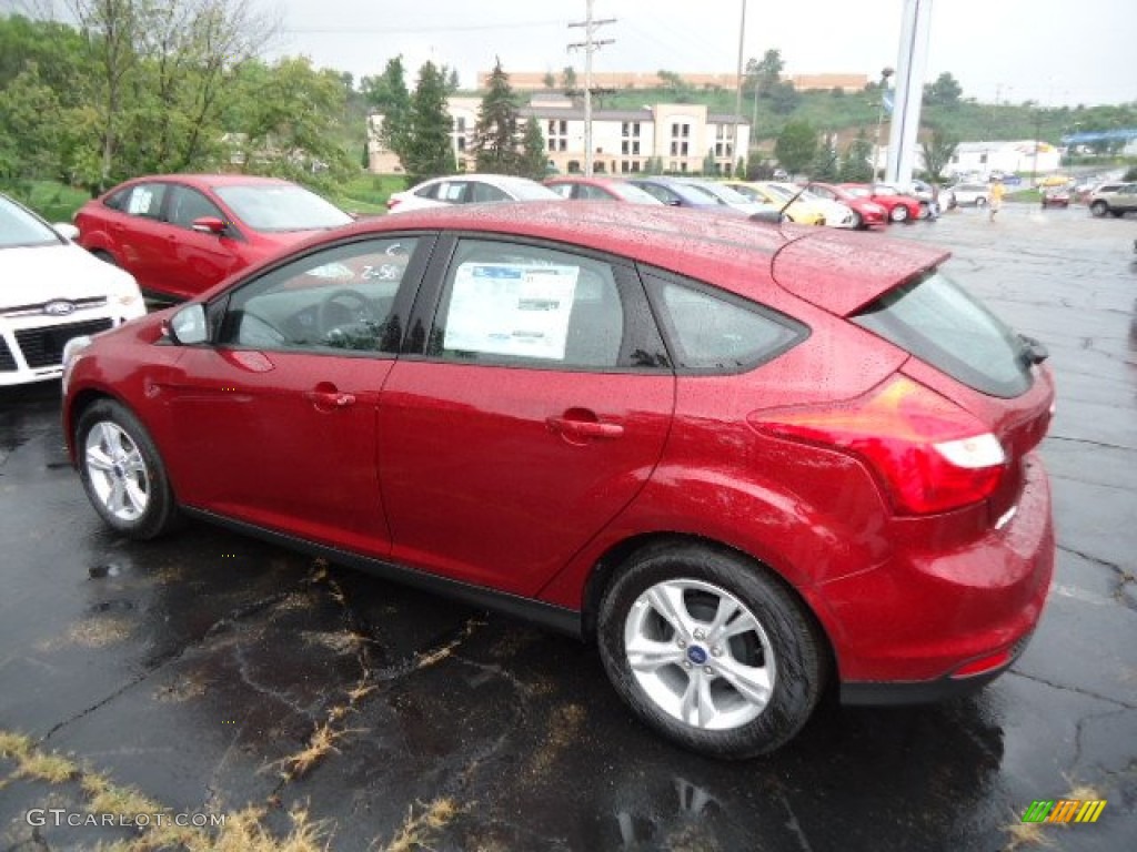 Ruby Red 2013 Ford Focus SE Hatchback Exterior Photo #69530789