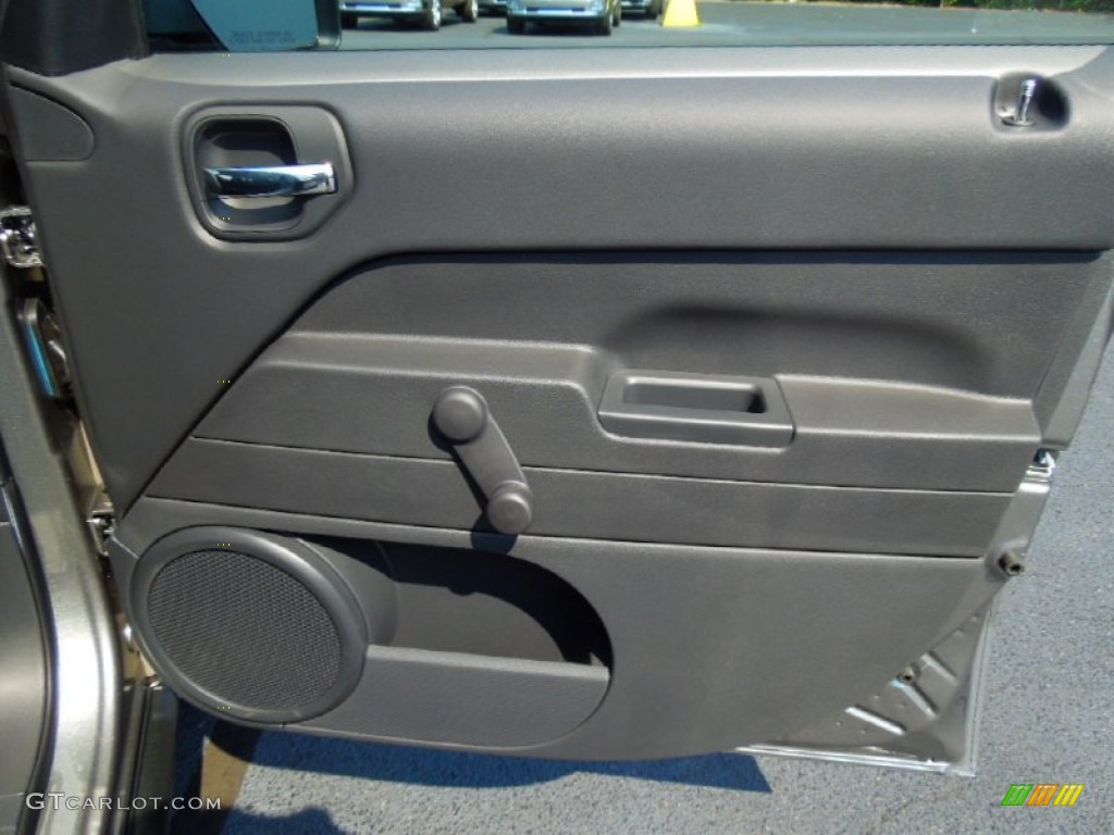 2013 Jeep Patriot Sport Dark Slate Gray Door Panel Photo #69533964