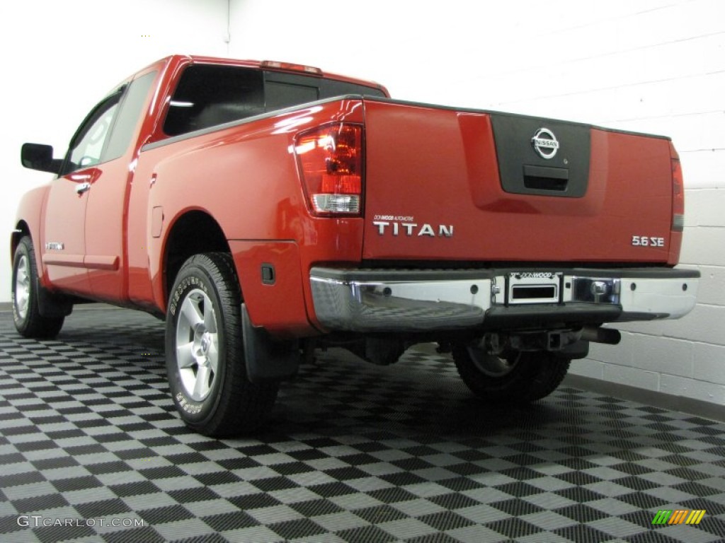 2005 Titan SE King Cab 4x4 - Red Alert / Graphite/Titanium photo #2