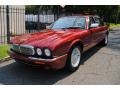 2000 Carnival Red Jaguar XJ Vanden Plas #69523403