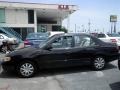 1998 Satin Black Metallic Toyota Corolla CE  photo #10