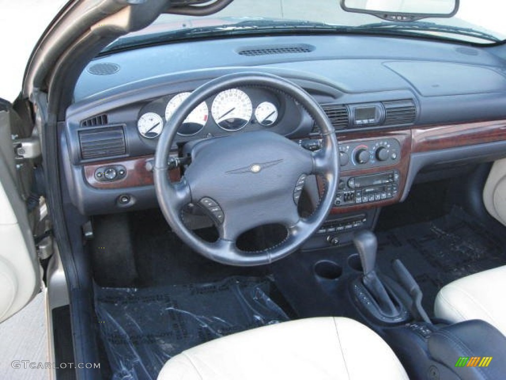 2002 Sebring Limited Convertible - Light Almond Pearl Metallic / Black/Beige photo #22