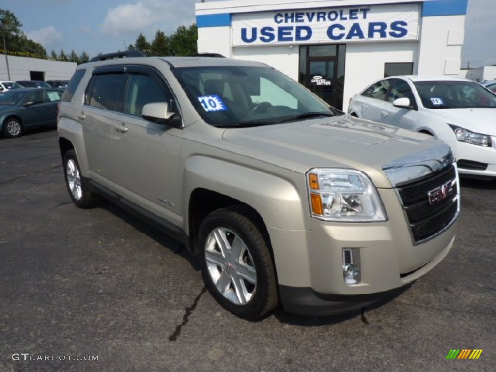 2010 Terrain SLE AWD - Gold Mist Metallic / Jet Black photo #1