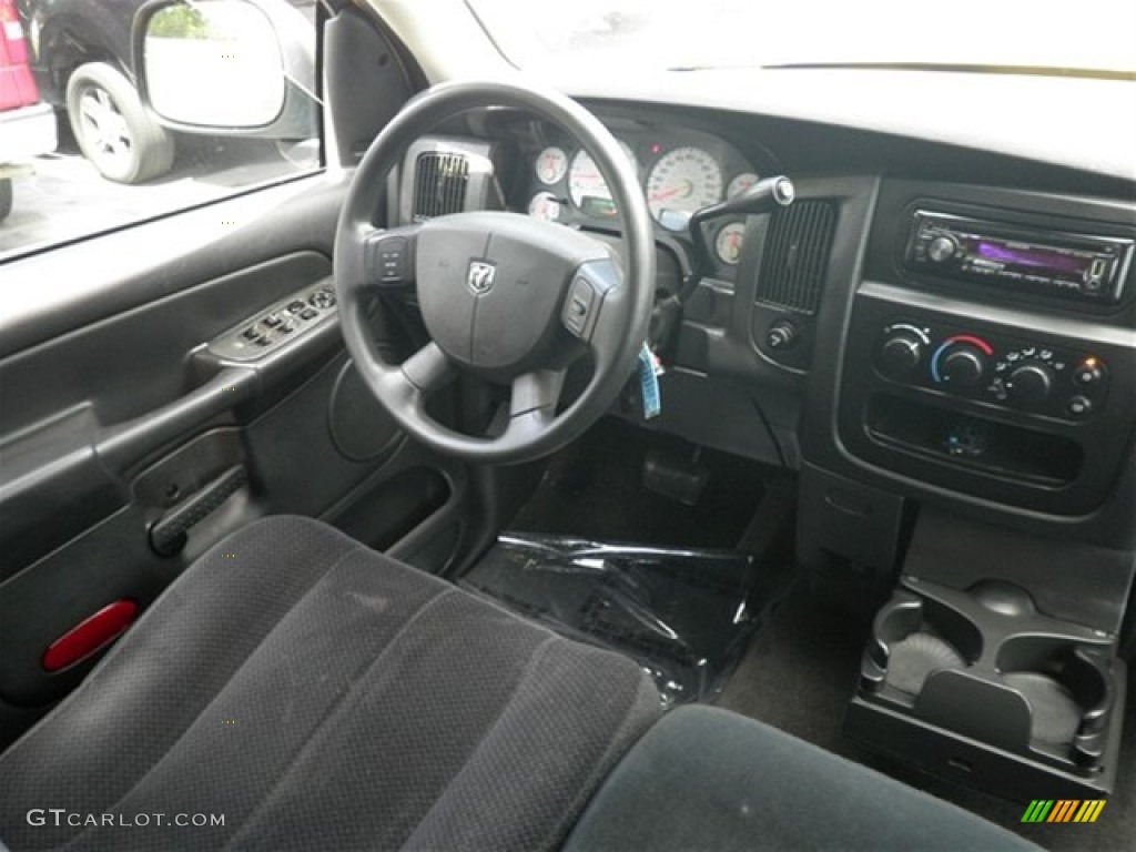 2004 Ram 1500 SLT Quad Cab - Solar Yellow / Dark Slate Gray photo #34