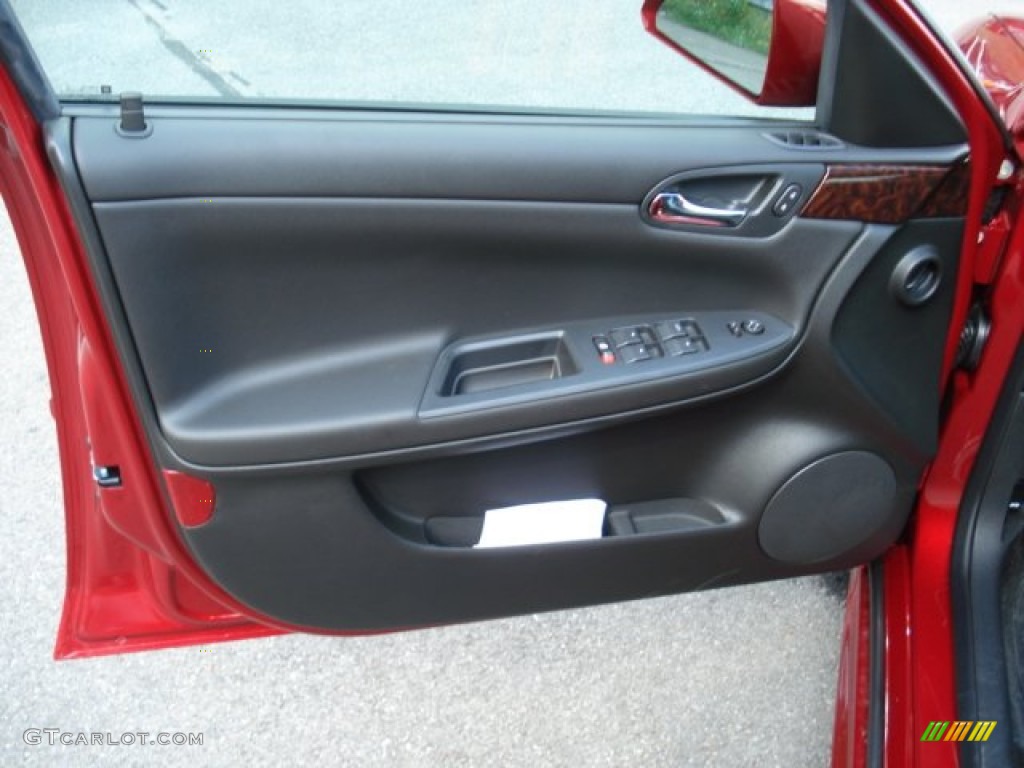 2013 Chevrolet Impala LT Ebony Door Panel Photo #69624277