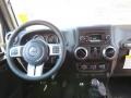 Dashboard of 2012 Wrangler Oscar Mike Freedom Edition 4x4