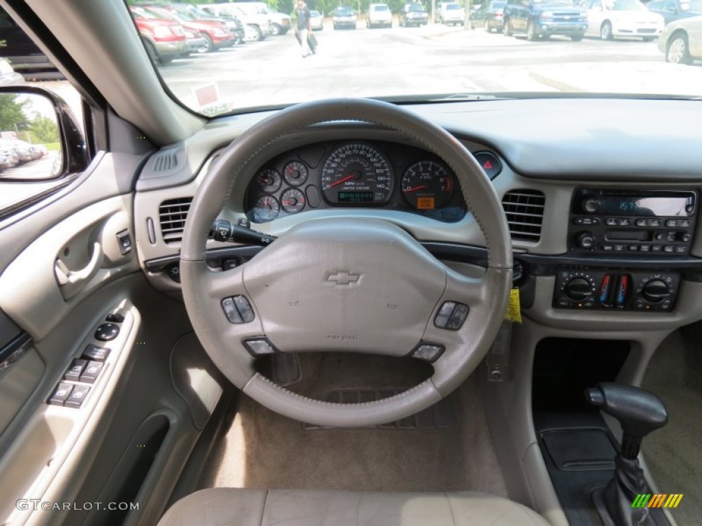 2004 Chevrolet Impala SS Supercharged Indianapolis Motor Speedway Limited Edition Neutral Beige Steering Wheel Photo #69644557