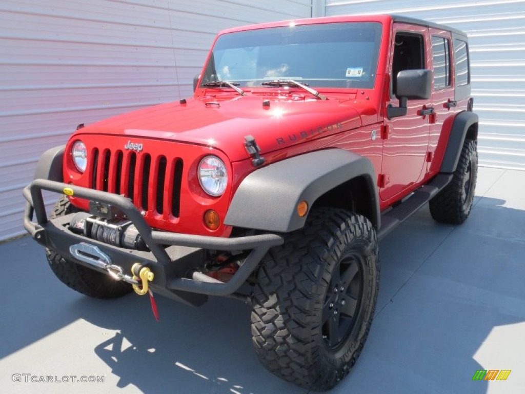 2011 Wrangler Unlimited Rubicon 4x4 - Flame Red / Black photo #6