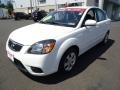 2010 Clear White Kia Rio LX Sedan  photo #2